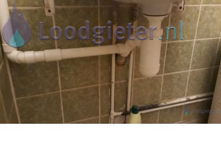 Loodgieter Ophangen wasbak Wasbak en kraan vervangen