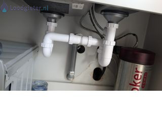 Loodgieter Verstopping keukenafvoer Gootsteen keuken loopt langzaam door