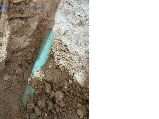 Loodgieter Waterleiding doorboord Doorboorde (kunststof) waterleiding in de vloer